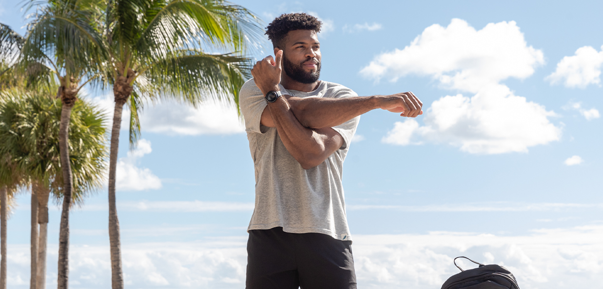 Man stretching in the Florida sun