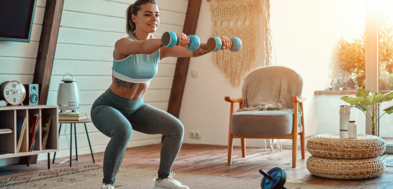 Woman working out to build and maintain her summer body