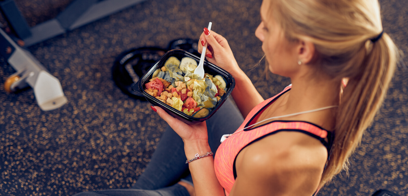 Woman breaking fast with nutritious whole foods meal