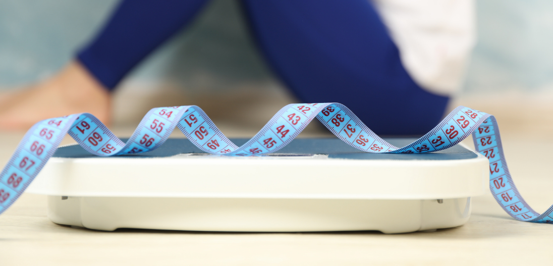 Measuring tape and scale used for weight loss