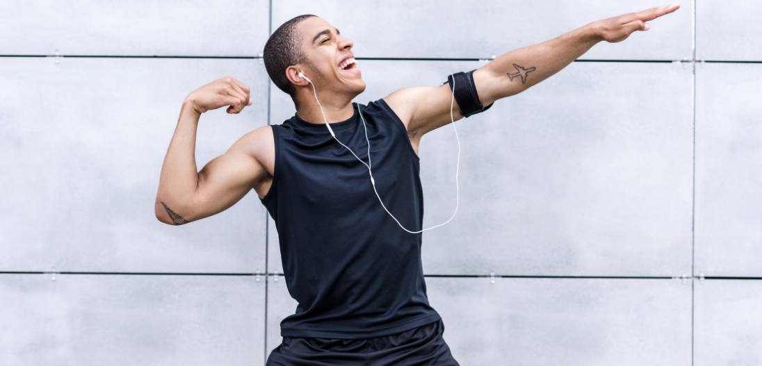 Man posing after a workout that gave him an endorphin boost