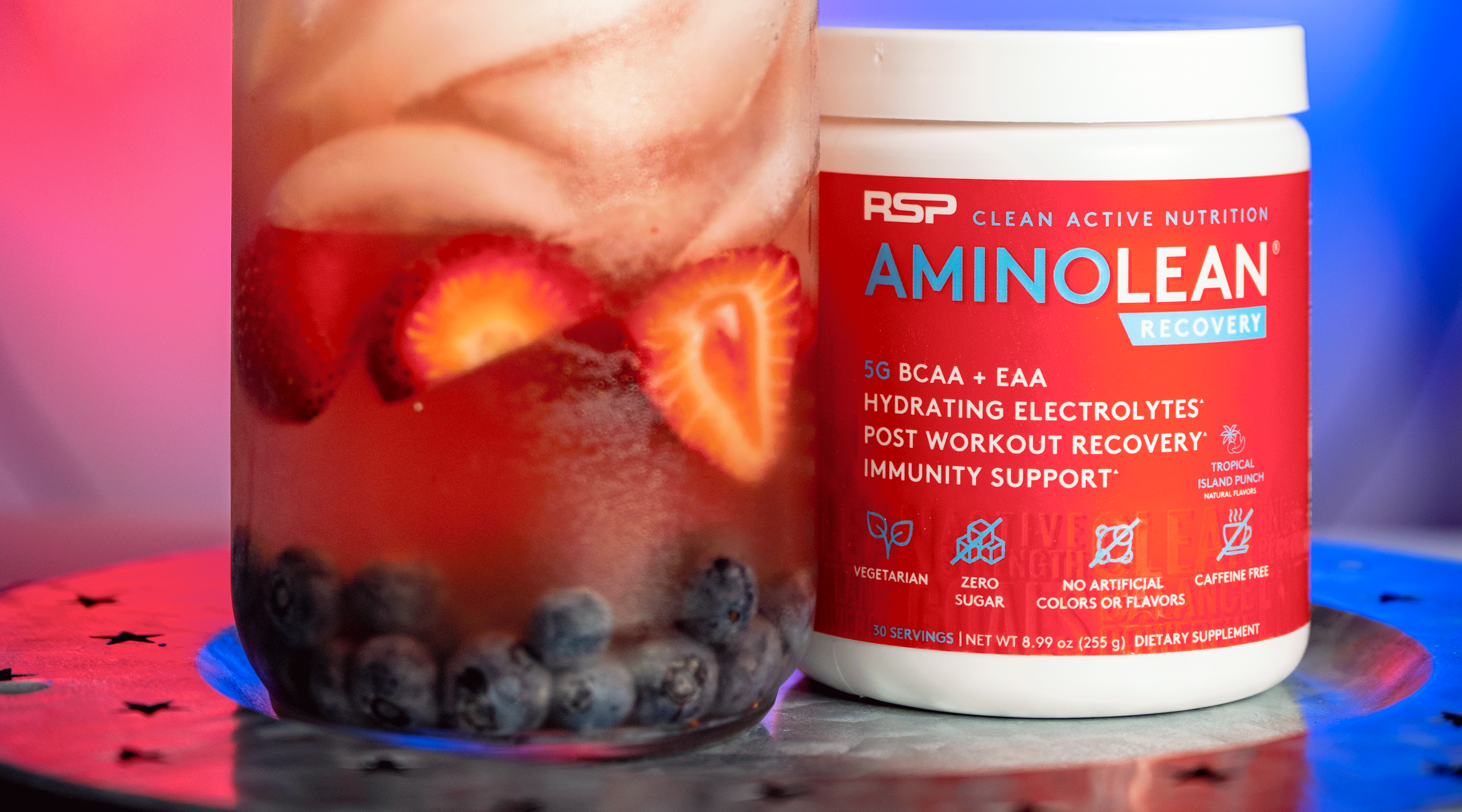 Amino lean Recovery tropical island punch with a berry recovery refresher drink
