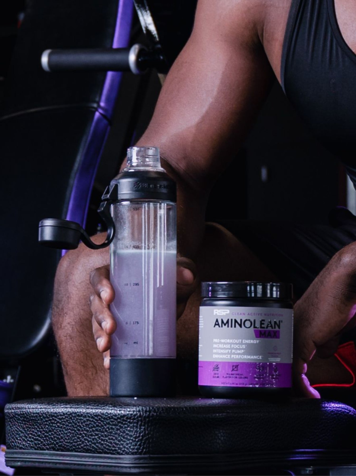 Man drinking amino lean max high intensity pre workout while exercising